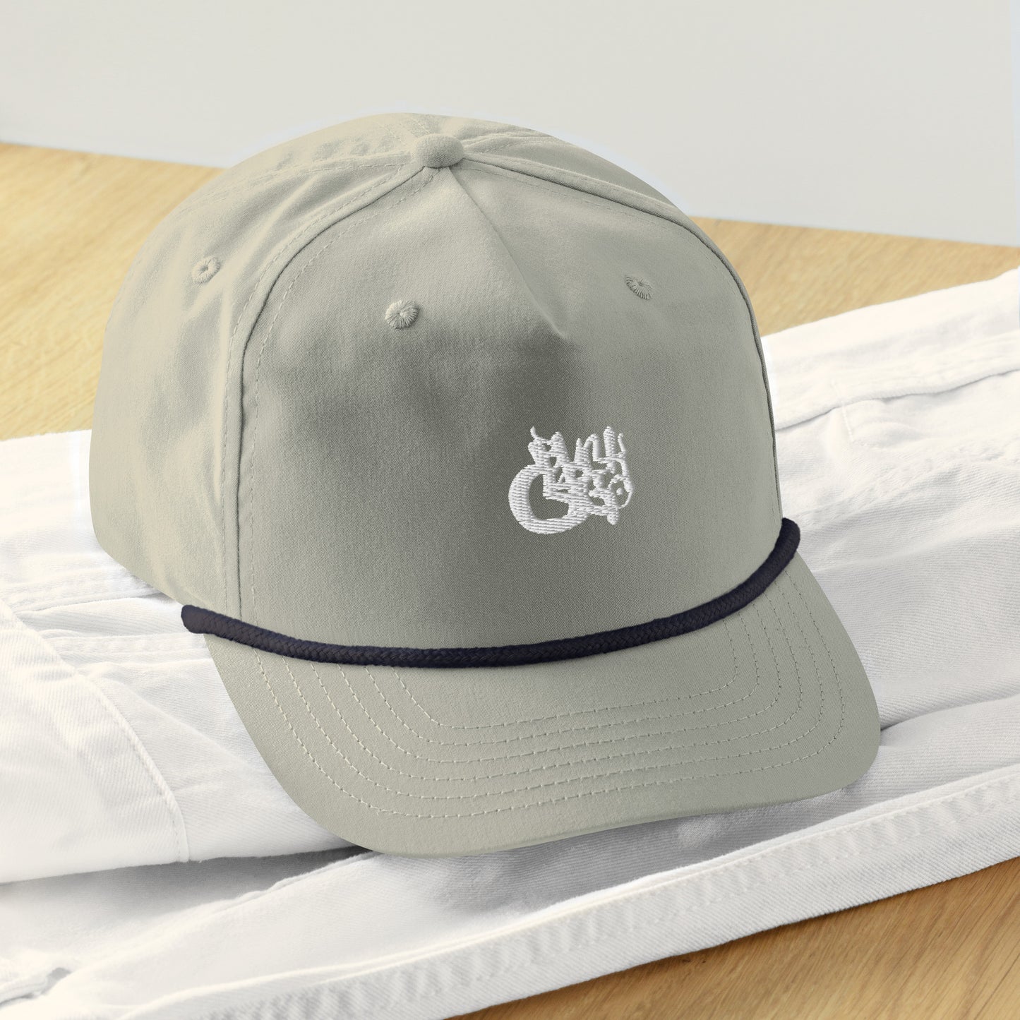 BlackCargo Apparel - Contemporary Urban Art Apparel for the Woke - Premium Quality - Unstructured, 5-panel - front panel lined -semi- curved bill with contrasting rope - Constrasting snap back closure - one size fits most - Golf Rope Cap