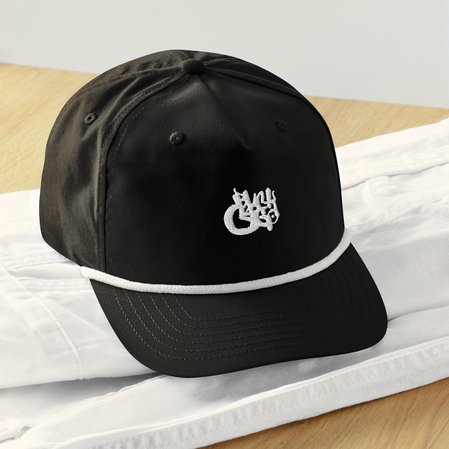 BlackCargo Apparel - Contemporary Urban Art Apparel for the Woke - Premium Quality - Unstructured, 5-panel - front panel lined -semi- curved bill with contrasting rope - Constrasting snap back closure - one size fits most - Golf Rope Cap